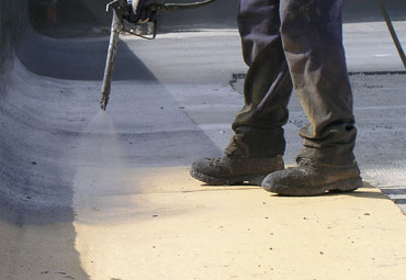 Coating systems over Oklahoma City spray foam roof systems