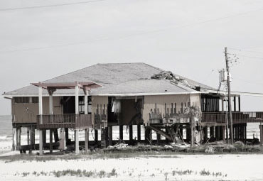 Wind damage - spray foam can help prevent uplift to Oklahoma City roofs